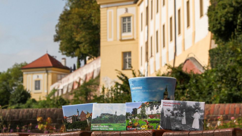 Souvenirs of the town Dachau, photo of refrigerator magnets in front of the Dachau castle