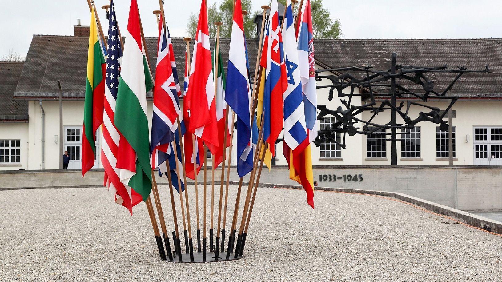 Photo of International Memorial at Concentration Camp Memorial Site Dachau with Nation Flags in front, photo: City of Dachau