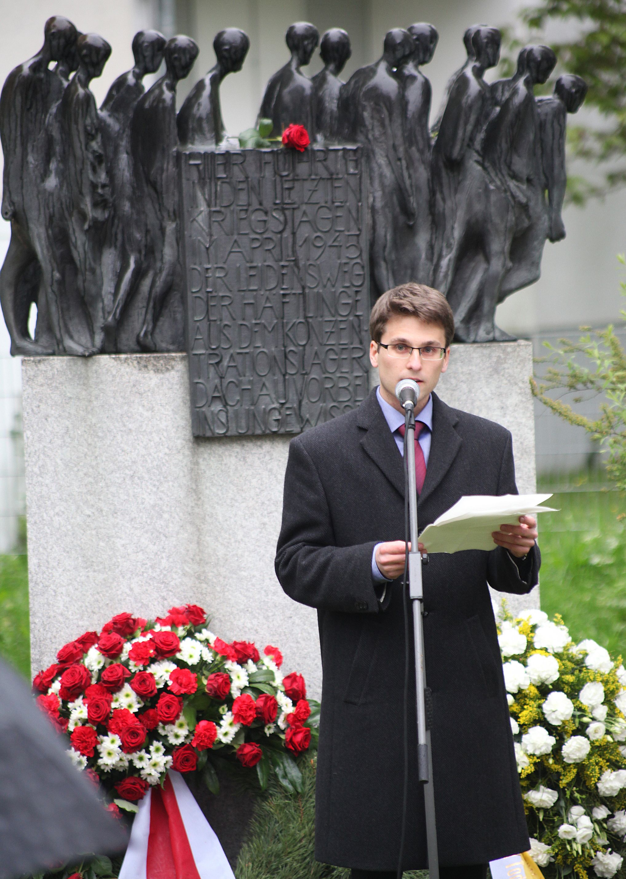 Photo of Mayor of Dachau, Florian Hartmann, giving a speech at the death march memorial in Dachau. Photo: City of Dachau