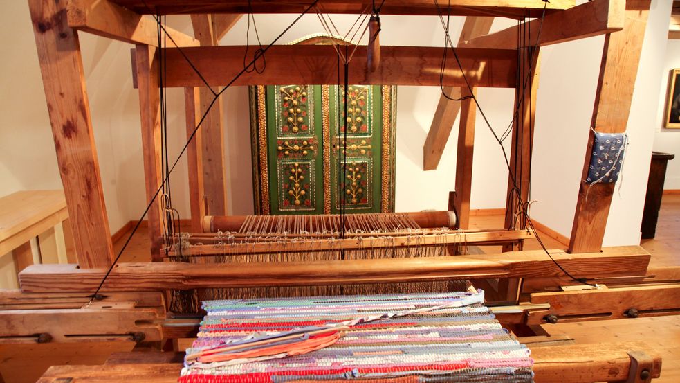 Photo of interior at Dachau District Museum with loom on exhibit. Photo: City of Dachau