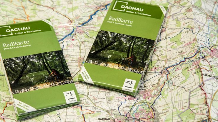 [Translate to English:] Photo of 2 cycle maps Dachau and district Dachau on unfolded cycle map