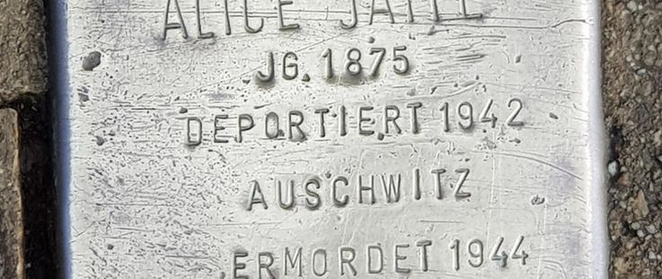 Bronze memorial stone, so-called stumbling stone in memory of Alice Jaffé